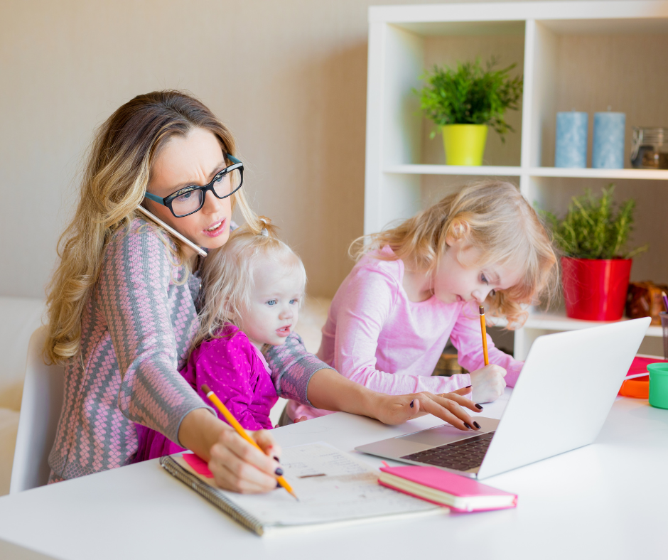 ETC All templates - 2026-07-01T120320.564 Manager reviewing employee time tracking reports on a laptop while working at home with kids
